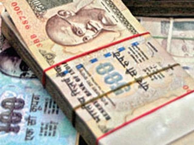 The manager deposited Rs 49,300 in his account and then Rs 10.7 lakhs in different places in the subsequent month to pay for a ‘fine’ that the lady had asked him to pay(HT File Photo) The manager deposited Rs 49,300 in his account and then Rs 10.7 lakhs in different places in the subsequent month to pay for a ‘fine’ that the lady had asked him to pay(HT File Photo)