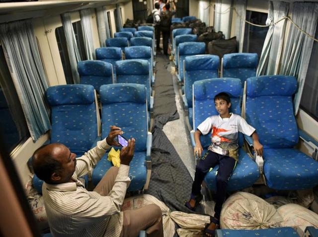 People takes photos inside a coach of Spanish Talgo train which arrived in Mumbai Central from Delhi in Mumbai.  (ARIJIT SEN/Hindustan Times) 