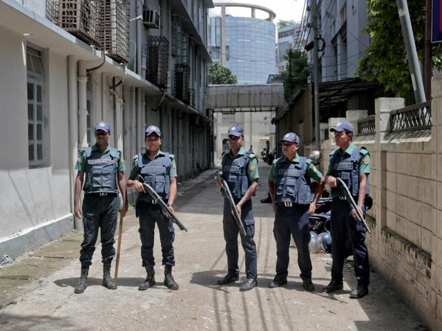 Bangladeshi students and teachers hold placards as they form a human chain to protest against terrorism in Dhaka on Monday. (AFP) Bangladeshi students and teachers hold placards as they form a human chain to protest against terrorism in Dhaka on Monday. (AFP)