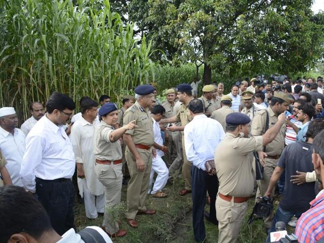 Senior police and administrative officials visit the area in fields of Dostpur village where a woman and her teenaged daughter were gangraped by armed robbers. (Sakib Ali/HT Photo) Senior police and administrative officials visit the area in fields of Dostpur village where a woman and her teenaged daughter were gangraped by armed robbers. (Sakib Ali/HT Photo)