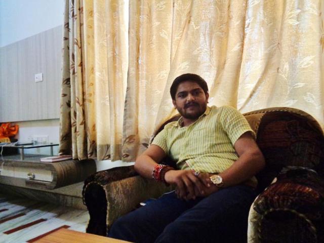 Hardik Patel, the leader of the Patidar movement in Gujarat, interacts with his supporters at a house in Udaipur.(HT Photo)