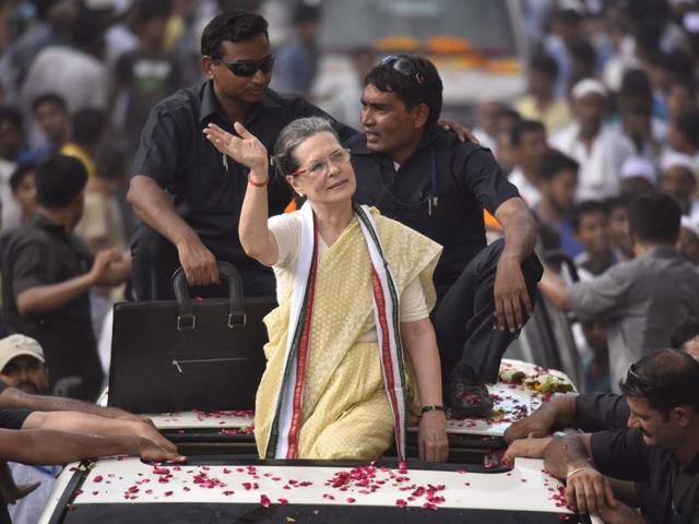 Congress president Sonia Gandhi waves towards supporters during a road show in Varanasi on Tuesday. (Ravi Choudhary/HT Photo) Congress president Sonia Gandhi waves towards supporters during a road show in Varanasi on Tuesday. (Ravi Choudhary/HT Photo)