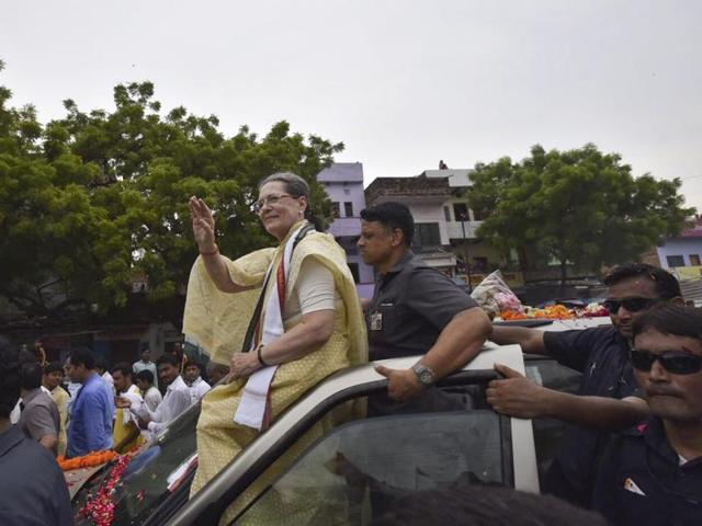 Congress president Sonia Gandhi greets people during party’s road show in Varanasi. (Ravi choudhary/HT Photo) Congress president Sonia Gandhi greets people during party’s road show in Varanasi. (Ravi choudhary/HT Photo)