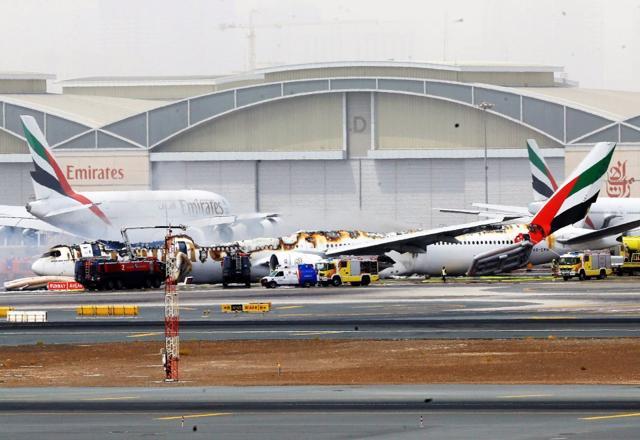 The roof of the plane totally charred after the fire was put out. Operations at the Dubai airport were suspended. (Reuters) The roof of the plane totally charred after the fire was put out. Operations at the Dubai airport were suspended. (Reuters)