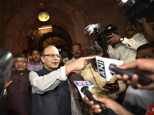 Finance minister Arun Jaitley coming out of the Rajya Sabha after the passage of the GST bill in New Delhi on Wednesday(Ajay Aggarwal/HT PHOTO)