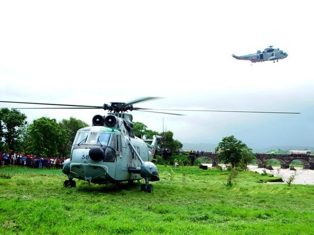Indian Navy Seaking 42C, an all weather aircraft with diving team has been launched by the Navy for the search and rescue operation after the bridge over Savitri river at mahad washed away by heavy rain.