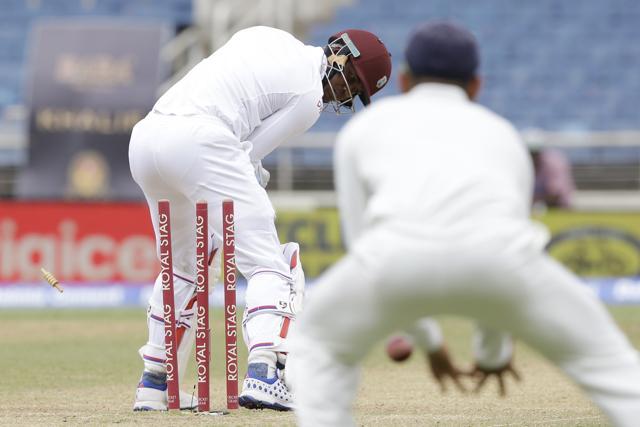 West Indies' batsman Marlon Samuels is bowled by India's Mohammed Shami during day four of their second cricket Test match at the Sabina Park Cricket Ground in Kingston, Jamaica on Tuesday. (AP)