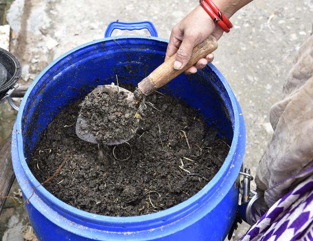 After initial reluctance, the residents agreed to participate in the project and eventually warmed up to the holistic management of waste in their area.(S Burmaula / HT Photo)