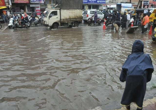 Flooded street at Manikbag, Sinhgad road after heavy rain in Pune, India, on Wednesday.