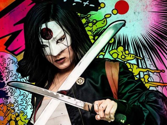 Karen Fukuhara as Tatsu Yamashiro / Katana, an expert martial artist and swordswoman. She serves as Rick Flag’s bodyguard and friend who wields the mystical Soultaker blade, capable of trapping the souls of its victims. Karen Fukuhara as Tatsu Yamashiro / Katana, an expert martial artist and swordswoman. She serves as Rick Flag’s bodyguard and friend who wields the mystical Soultaker blade, capable of trapping the souls of its victims.