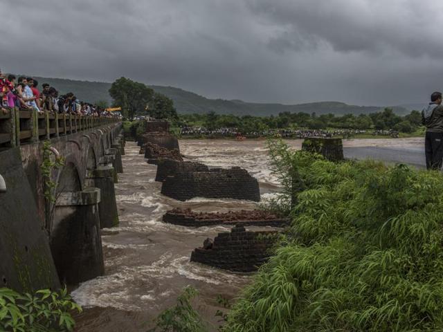 The remains of the Mahad bridge which collapsed on Tuesday killing three people.(Satish Bate/HT Photo)