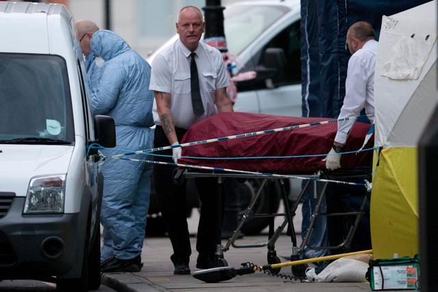 A private ambulance crew removes a body from Russell Square in London, after a woman was killed in a knife attack in central London. (AFP Photo) A private ambulance crew removes a body from Russell Square in London, after a woman was killed in a knife attack in central London. (AFP Photo)