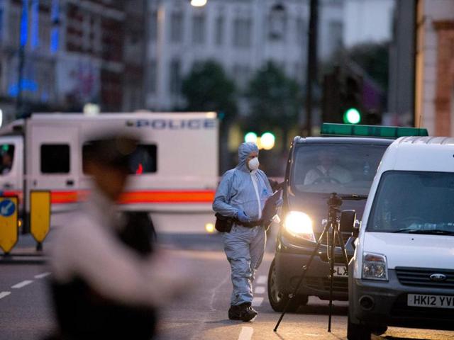 Armed police arrested a 19-year-old man at Russell Square after he attacked a woman who was in her 60s and who died from her injuries at the scene. (AFP Photo)