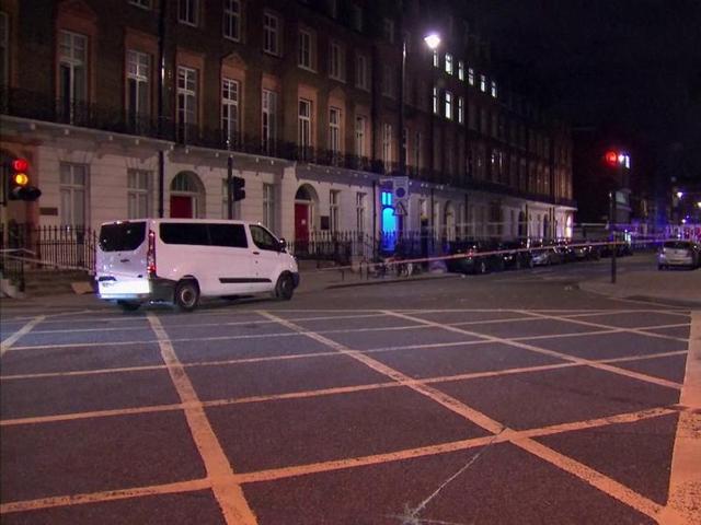 The area where a knife attack happened is cordoned off in London. (AP)