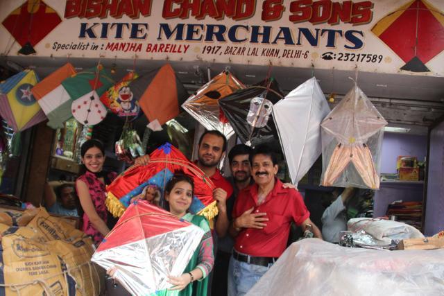 Yatin (third from left) , a resident of Gurgaon, buys kites only from Bishan Chand. (Shivam Saxena/HT)