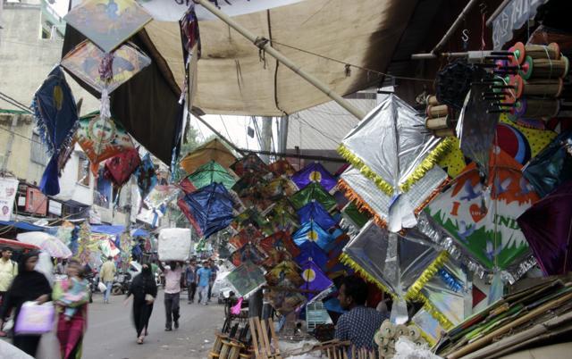Lal Kuan market is filled with kites, and the most popular designs here display the colours of the national flag. (Shivam Saxena/HT)