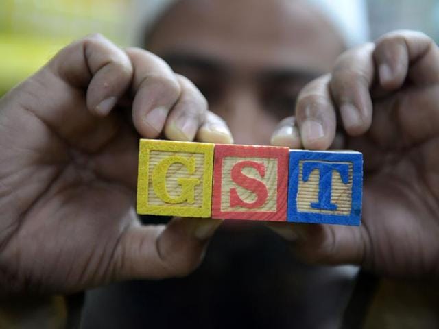 The Goods and Services Tax (GST) will replace a patchwork of central and state levies on goods and services and is one of Prime Minister Narendra Modi's biggest reforms since taking power in May 2014 .(AFP) The Goods and Services Tax (GST) will replace a patchwork of central and state levies on goods and services and is one of Prime Minister Narendra Modi's biggest reforms since taking power in May 2014 .(AFP)