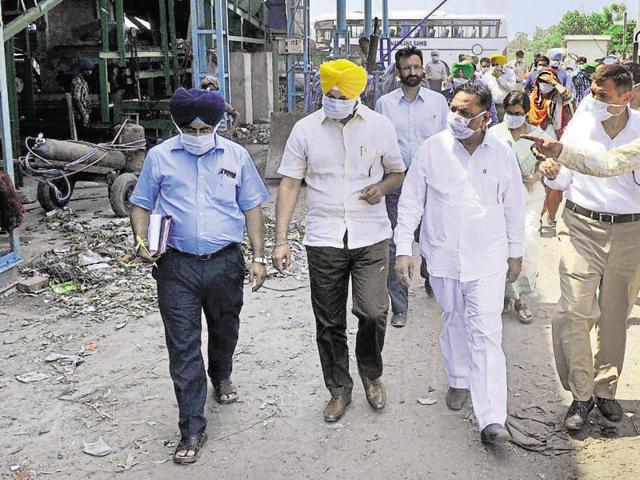 Members of Vidhan Sabha Committee inspecting the garbage disposal plant near village Kakka in Ludhiana Wednesday.(JS Grewal/ HT photo)