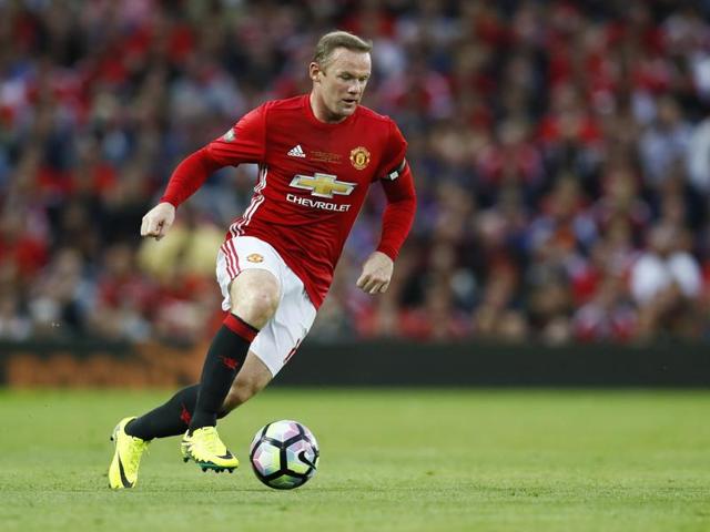 Fans spell out the name of Manchester United's Wayne Rooney ahead of his testimonial match against Everton.(AFP) Fans spell out the name of Manchester United's Wayne Rooney ahead of his testimonial match against Everton.(AFP)