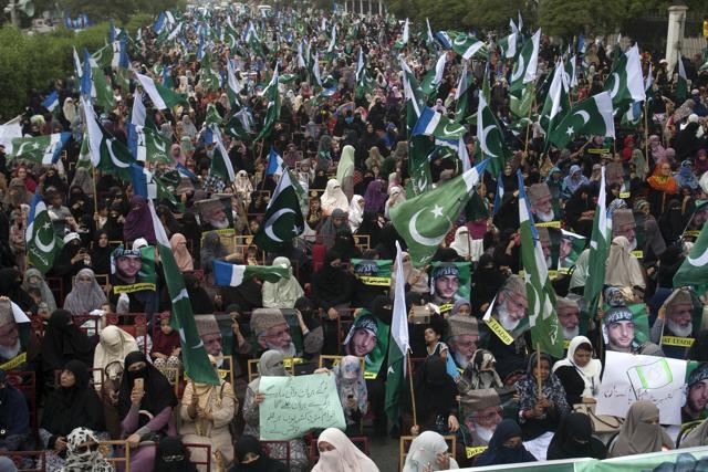 Women supporters of Pakistani religious party Jamaat-e-Islami attend an anti-Indian rally in Karachi. (AP) Women supporters of Pakistani religious party Jamaat-e-Islami attend an anti-Indian rally in Karachi. (AP)