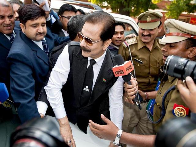 Security officials escort Sahara group chairman Subrata Roy (C) on his arrival at the Supreme Court in New Delhi on March 4, 2014. (AFP File Photo) Security officials escort Sahara group chairman Subrata Roy (C) on his arrival at the Supreme Court in New Delhi on March 4, 2014. (AFP File Photo)