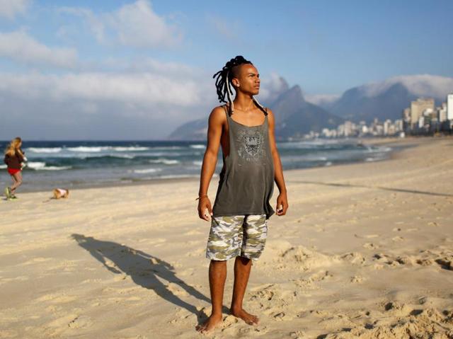 Student and acrobat Guilherme Barbosa said "Those in a position to rent out rooms in their houses can earn extra income, as well as those who work in the tourism industry. But most people are abandoned in precarious health and education services." If there was a vote, he would cast against the Olympics. (REUTERS)