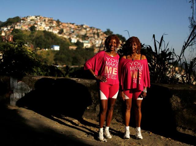 Silvana Batista (left), a 49-year-old retired nurse, poses with her mother, Helena Batista, in Rio de Janeiro. Both women hope the event will be a success and people who come to the city will have the best experience. (REUTERS)