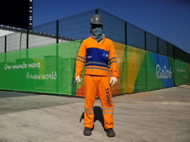 Dennis Claudinho, a 27-year-old construction worker, poses for a portrait in Rio de Janeiro, Brazil, July 11, 2016. Dennis says, "I can't afford tickets to the Olympics because they are too expensive." (REUTERS)