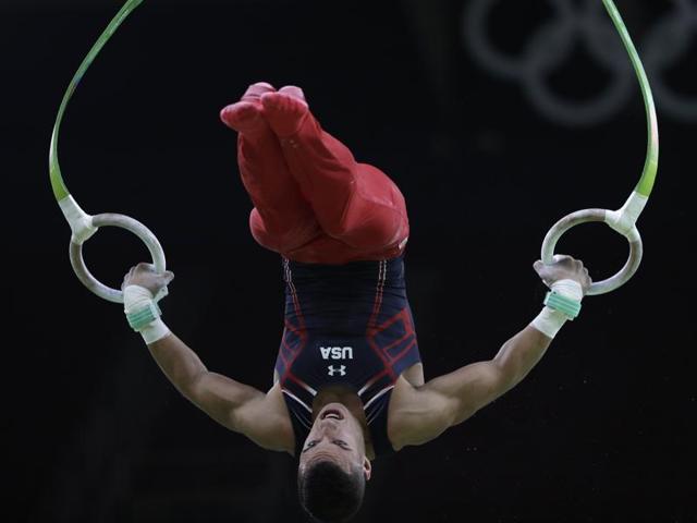 US Gymnast Jacob Dalton trains on the rings ahead of the Olympics on Wednesday. (AP Photo) (AP)