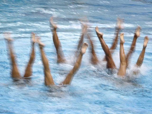 Japan's synchronized swimming team train at the Maria Lenk Aquatic Center ahead on Wednesday. (AP Photo) (AP)
