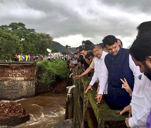 Maharashtra chief minister Devendra Fadnavis reviews the operations at the Mahad-Poladpur bridge on Wednesday. (PTI Photo) Maharashtra chief minister Devendra Fadnavis reviews the operations at the Mahad-Poladpur bridge on Wednesday. (PTI Photo)