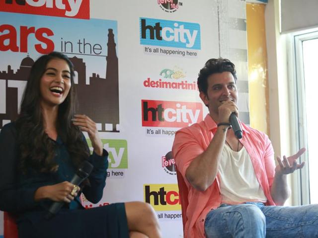 Mohenjo Daro is an ambitious new film by Bollywood director Ashutosh Gowariker.  Hrithik and Pooja enjoy the Q&A session with fans. (Amal KS/ HT Photo) 