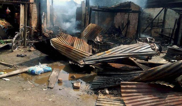 Damaged shops after an attack by NDFB (S) terrorists in the market area at Balajan Tinali near Kokrajhar town in Assam on Friday. (PTI)