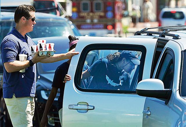 “Natasha” Obama departs Nancy's Restaurant, in Oak Bluff, after working her shift . (AP)