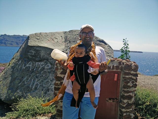 Kanu celebrates a successful quest while on vacation on the Greek island of Santorini, with his wife and eight-month-old daughter. Kanu celebrates a successful quest while on vacation on the Greek island of Santorini, with his wife and eight-month-old daughter.