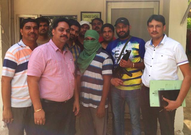 The gym trainer is police custody.