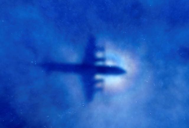 The shadow of a Royal New Zealand Air Force (RNZAF) P3 Orion maritime search aircraft can be seen on low-level clouds as it flies over the southern Indian Ocean looking for missing Malaysian Airlines flight MH370 March 31, 2014. (REUTERS) The shadow of a Royal New Zealand Air Force (RNZAF) P3 Orion maritime search aircraft can be seen on low-level clouds as it flies over the southern Indian Ocean looking for missing Malaysian Airlines flight MH370 March 31, 2014. (REUTERS)