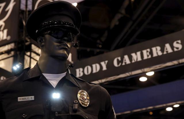 Police body cameras are seen on a mannequin at an exhibit booth by manufacturer Wolfcom at the International Association of Chiefs of Police conference in Chicago, Illinois. (Reuters File Photo) Police body cameras are seen on a mannequin at an exhibit booth by manufacturer Wolfcom at the International Association of Chiefs of Police conference in Chicago, Illinois. (Reuters File Photo)