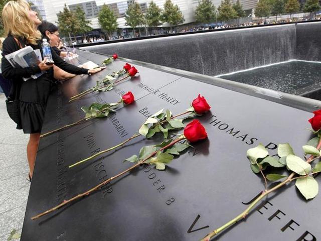 Family members of victims of the 9/11 attacks on the World Trade Center visit the South Pool during ceremonies marking the 10th anniversary in New York, September 11, 2011.(Agency file photo)