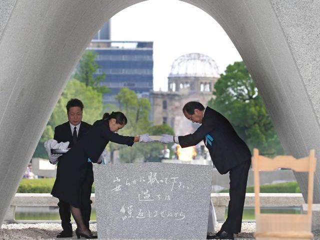 People pray in front of the cenotaph for the victims of the 1945 atomic bombing at Peace Memorial Park in Hiroshima, western Japan. (Reuters) People pray in front of the cenotaph for the victims of the 1945 atomic bombing at Peace Memorial Park in Hiroshima, western Japan. (Reuters)