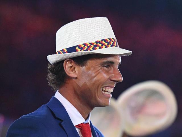 Spain's flag-bearer Rafael Nadal leads their delegation during the opening ceremony of the Rio 2016 Olympic Games. (AFP Photo)