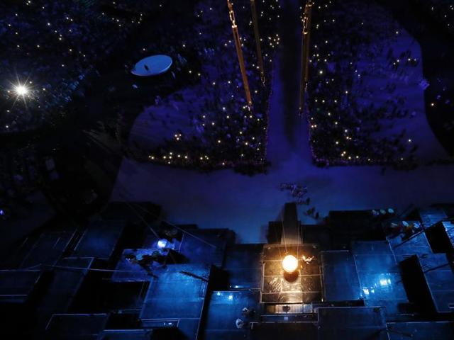 Vanderlei de Lima lights the Olympic flame during the Rio Olympics opening ceremony. (AP Photo)