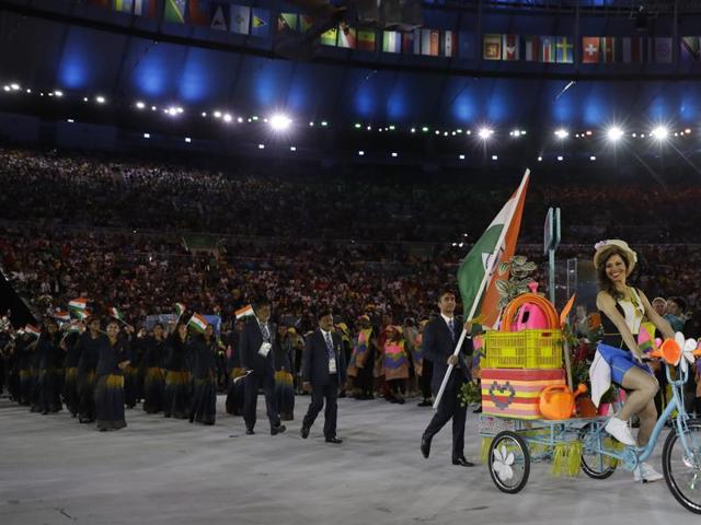 Flag-bearer Abhinav Bindra leads the Indian contingent during the opening ceremony for the 2016 Summer Olympics in Rio de Janeiro, Brazil. (AP Photo)