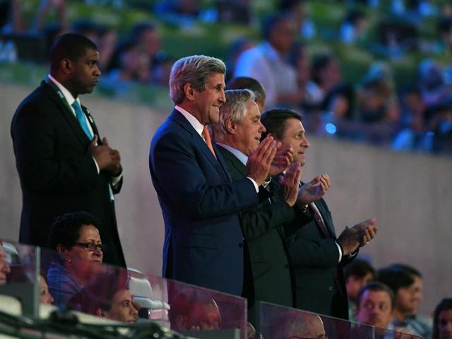 US secretary of state John Kerry applauds the United States Olympic team during the opening ceremony for the Summer Games at Maracana Stadium in Rio de Janeiro. (AP Photo)