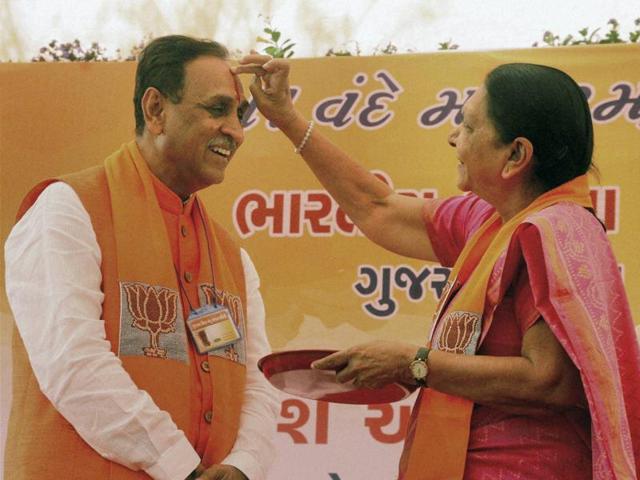 File photo of Vijay Rupani with the former Gujarat chief minister Anandiben Patel in Gandhinagar. (PTI Photo) File photo of Vijay Rupani with the former Gujarat chief minister Anandiben Patel in Gandhinagar. (PTI Photo)