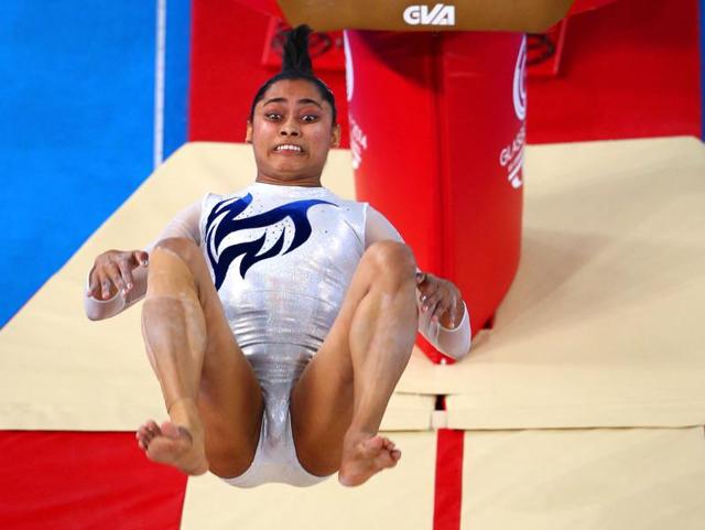 Gymnast Dipa Karmakar speaks with a team member during a practice session in Rio de Janeiro.(AP)