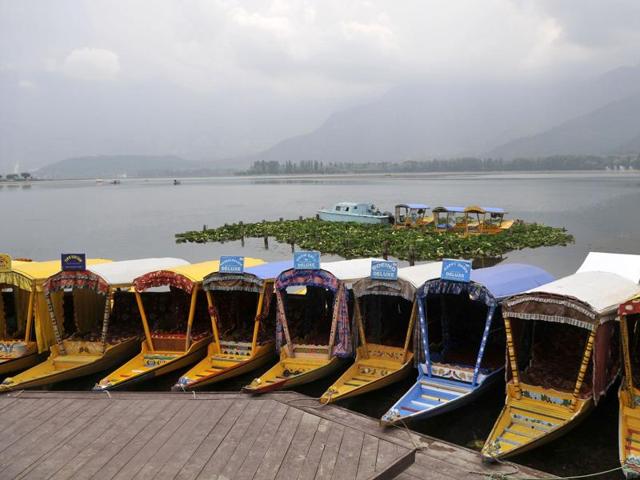 Empty shikaras lined up in the Dal Lake during a curfew in Srinagar. (Waseem Andrabi /HT Photo) Empty shikaras lined up in the Dal Lake during a curfew in Srinagar. (Waseem Andrabi /HT Photo)