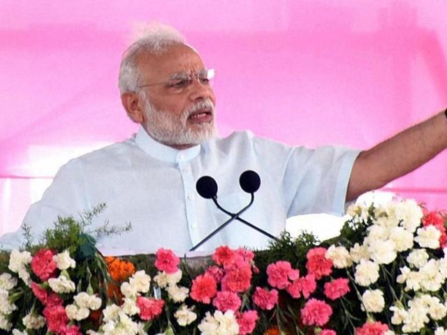 Prime Minister Narendra Modi addressing a public meeting at Gajwel, Medak District, in Telangana on Sunday. (PTI) Prime Minister Narendra Modi addressing a public meeting at Gajwel, Medak District, in Telangana on Sunday. (PTI)