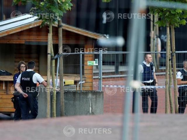 Belgian police officers stand guard outside the main police station after a machete-wielding man injured two female police officers before being shot in Charleroi, Belgium. (Reuters) Belgian police officers stand guard outside the main police station after a machete-wielding man injured two female police officers before being shot in Charleroi, Belgium. (Reuters)