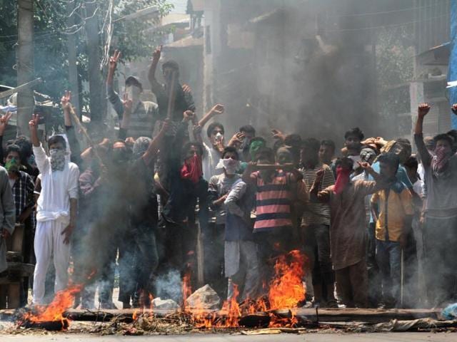 Kashmiri protesters shout slogans and burn tyres during a protest in Srinagar. More than 50 people have died and thousands wounded in clashes with security forces. (Waseem Andrabi /HT Photo) Kashmiri protesters shout slogans and burn tyres during a protest in Srinagar. More than 50 people have died and thousands wounded in clashes with security forces. (Waseem Andrabi /HT Photo)